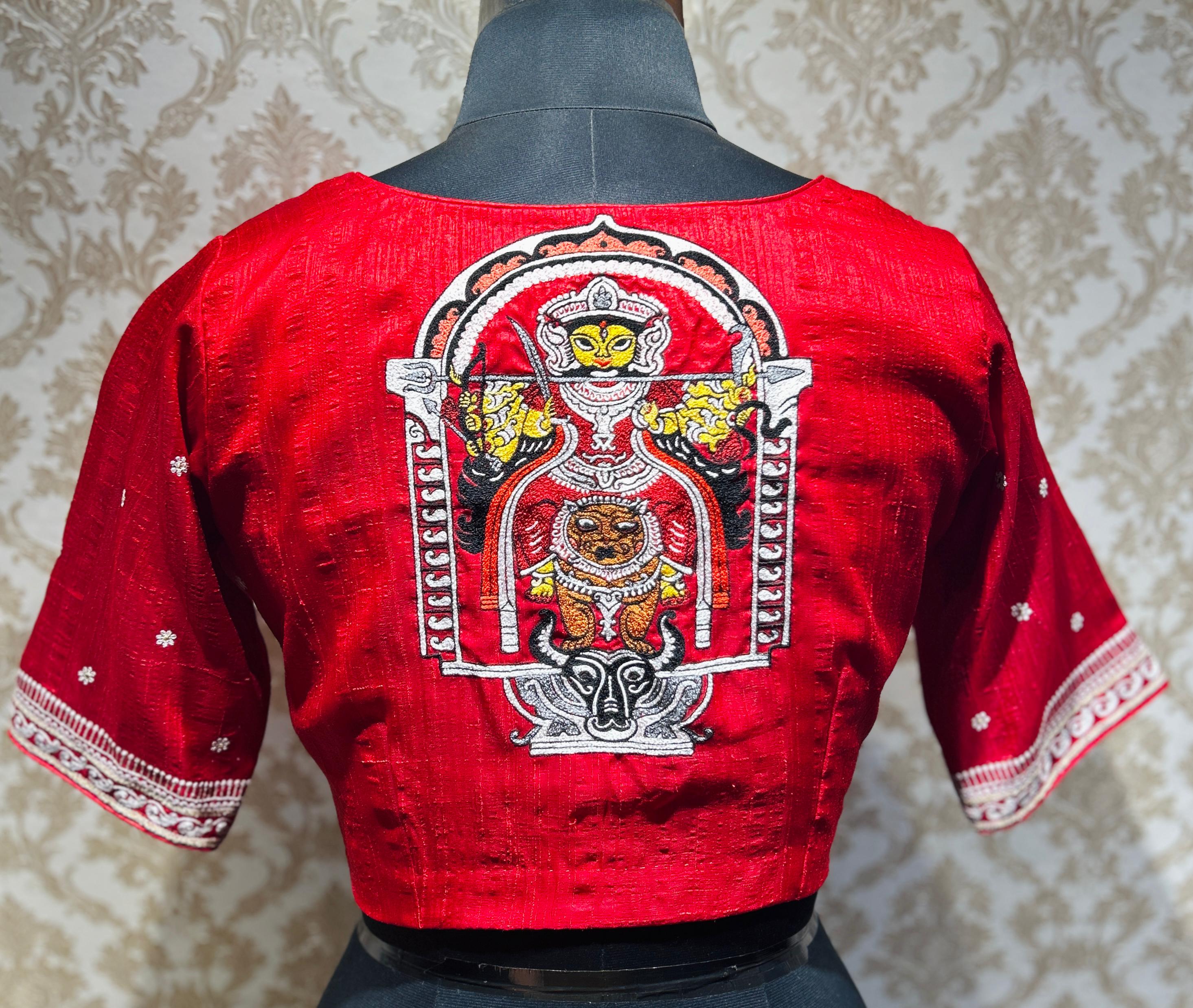 A striking tomato red blouse